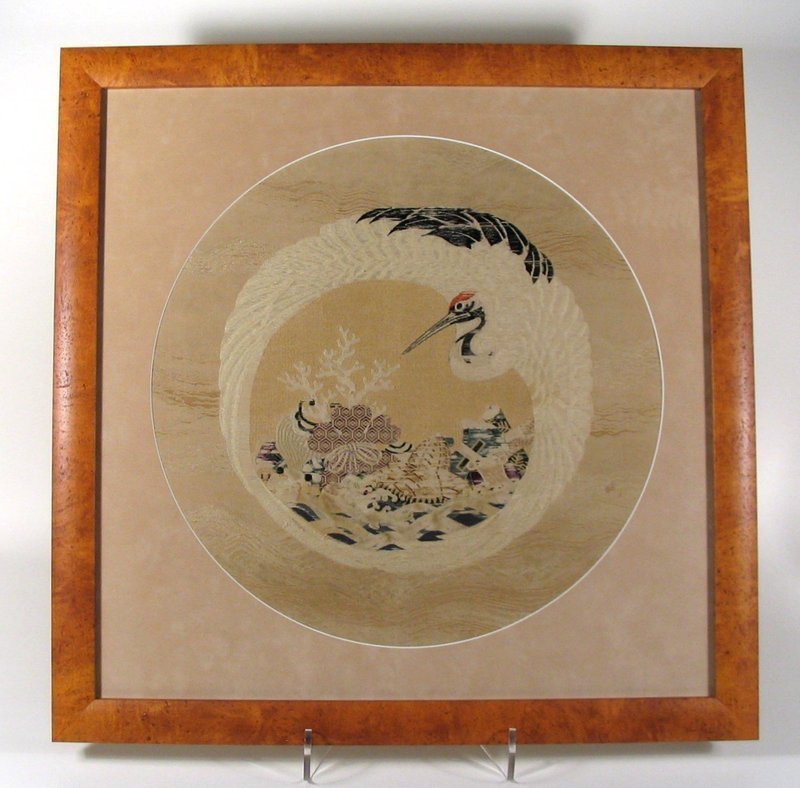 DESCRIPTION:  A Japanese fukusa of brocade silk in a supplementary weft weave with both silk and gold metallic threads forming the design of a large crane with wings encircling various sea treasures.  Used a gift cover and traditionally draped over a gift given for birthdays or New Years, the choice of an appropriate fukusa suited to the occasion was an important part of the gift-giving ritual.  This one has been matted and set in a handsome burl frame.  C.1920; wear to threads in a few areas.  DIMENSIONS:  24 1/4" square in frame (61.6 cm). <div id='rater_target1221458'></div>
