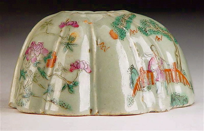 DESCRIPTION: A lovely porcelain leaf-form famille rose water coupe with pale celadon ground. Delicately painted on the surface are found various figures in a floral landscape. In excellent original condition, it dates from the mid 19th century, Qing Dynasty. DIMENSIONS: 3 ½” wide x 2 3/4” high. <div id='rater_target1264842'></div>
