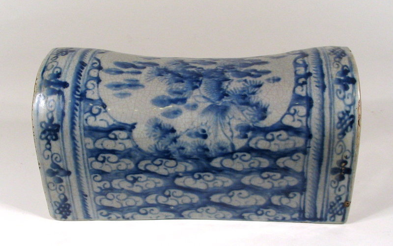 DESCRIPTION:  A large Chinese porcelain pillow decorated in underglaze  blue with fish and aquatic plants surrounded by clouds.  Dating from the 19th C., Qing Dynasty.  CONDITION:  A few old chips to the rims.  DIMENSIONS: SIZE: 10 1/2" long (26.7 cm) x 5 1/2" high (14 cm) x 5" deep (12.8 cm).  <div id='rater_target1265188'></div>
