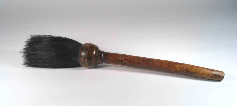 DESCRIPTION:  A large wooden scholar’s brush used to paint large calligraphy.  Thick black bristles are gathered into a bulbous wood ferrule, turned from the same wood as the handle.  The tip of the handle is pierced for hanging.  A very nice old brush, good for display in large brush pots; 19th C., normal wear as would be expected.  DIMENSIONS:  16” long (41 cm). <div id='rater_target1269057'></div>
