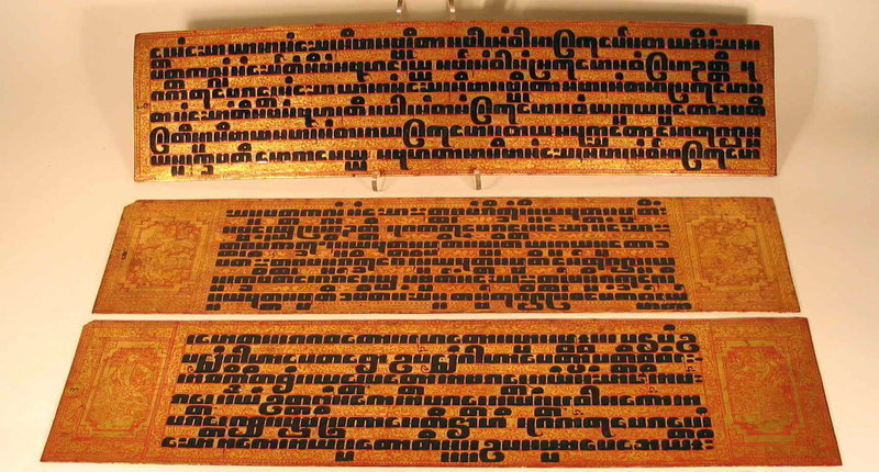 for all three<br /><br />
DESCRIPTION: Four beautifully detailed, red and gold lacquered sheets of Burmese Buddhist manuscripts describing rules of ceremony.  Kammawasa are elaborately decorated manuscripts extracted from the Pali Vinaya pitaka, the monastic code of discipline which is generally read aloud at monastic assemblies. Topics covered would include formalities for the ordination of monks and the bestowal of their robes, the consecration of an ordination hall, celebrating the festival of the full moon, and other such ceremonies.  
<p>Kammawasa may be inscribed on palm leaf, ivory, copper, or even on pieces of discarded monks’ robes which have been lacquered to provide a rigid surface. The text is composed in the large Burmese square script, known as “tamarind seed script” and are stored in an elaborate lacquer box made specifically for that purpose (see our listing TBS16 for an example). All pages of this group are double sided, one side with script and the other with rich and highly complex scenes in gold lacquer.  All sheets are in very good condition and date to the 19th C.  DIMENSIONS:  Each approximately 23” long (58.5 cm) x 5 ½” (14 cm).    
<div id='rater_target1283534'></div>
