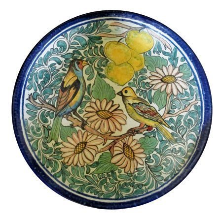 DESCRIPTION: A beautifully painted, very large Mexican charger (or platter) with a dark blue outer rim framing two birds perched in a tree, surrounded by scrolling green foliage, large flowers and yellow fruit.  Dating from the 1960's, on the reverse is written "Mexico"; the back is pierced with holes for hanging.  Excellent condition with no chips, cracks or repairs. DIMENSIONS:  A large 18" diameter (45.8 cm). <div id='rater_target1303662'></div>
