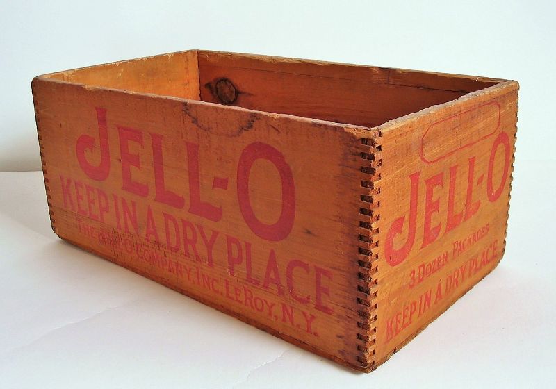DESCRIPTION:  Vintage wood advertising crate with “Jell-O” and other messages stenciled on four sides; dovetailed corners. Good condition, expected usage ware, sturdy. DIMENSIONS:  14” long x 6” high x 8”deep.
<div id='rater_target1387371'></div>
