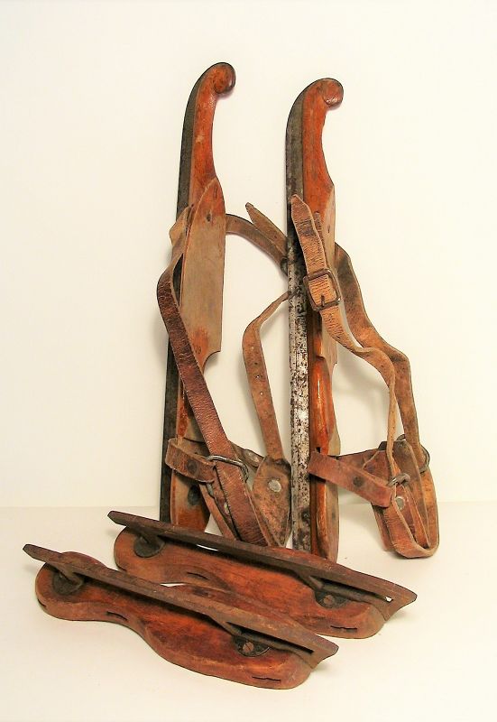DESCRIPTION: Two pair of antique ice skates, one large pair with original leather straps and curled tips, plus one smaller wooden pair.  Stamped on the blade of the larger pair is “BATAVUS, HEERENVEEN.”  Batavus is a Dutch bicycle manufacturer which began in 1904, and was located in Heerenveen, a town in the north of the Netherlands.  In the 1930’s, Batavus diversified to include tricycles, motorcycles, and ice skates.  Heerenveen went on to gain international prominence in speed skating, with the fastest lowland speed skating rink in the world.  This pair would make a nice hanging display in a winter lodge or chalet. DIMENSIONS:  Largest Pair 16” long.
<div id='rater_target1394888'></div>
