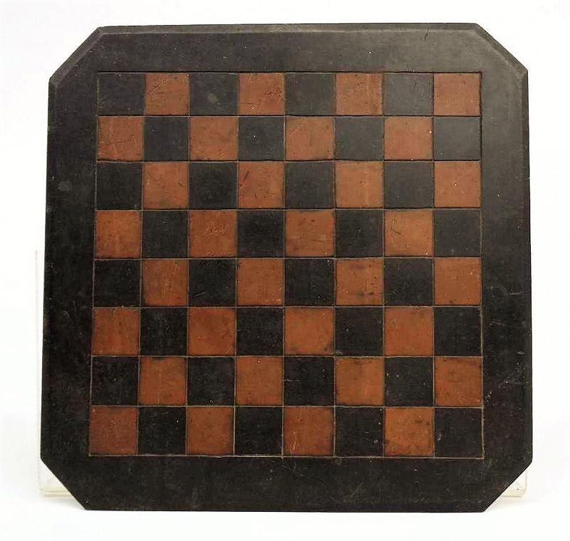 DESCRIPTION: A handsome, engraved and painted slate checkers and chest game board, the solid board with beveled corners and alternating brown squares with round felt pads on back four corners. Sourced in Vermont, very good condition. DIMENSIONS: 15 1/4" x 15 1/2".

<div id='rater_target1398979'></div>
