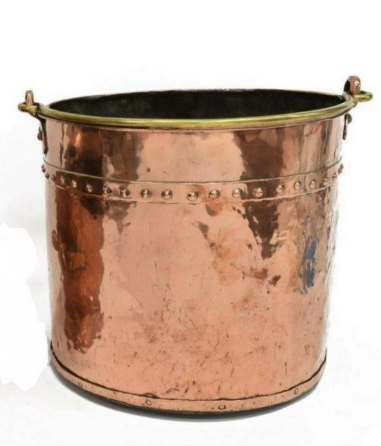 DESCRIPTION:  A handsome English hand-hammered copper bucket with sturdy brass bail handle and studded band, in good condition. Late 19th c.  This bucket will make an attractive fireplace accessory for holding wood and kindling.  DIMENSIONS: 12.5" high x 14" diameter.
<div id='rater_target1416555'></div>
